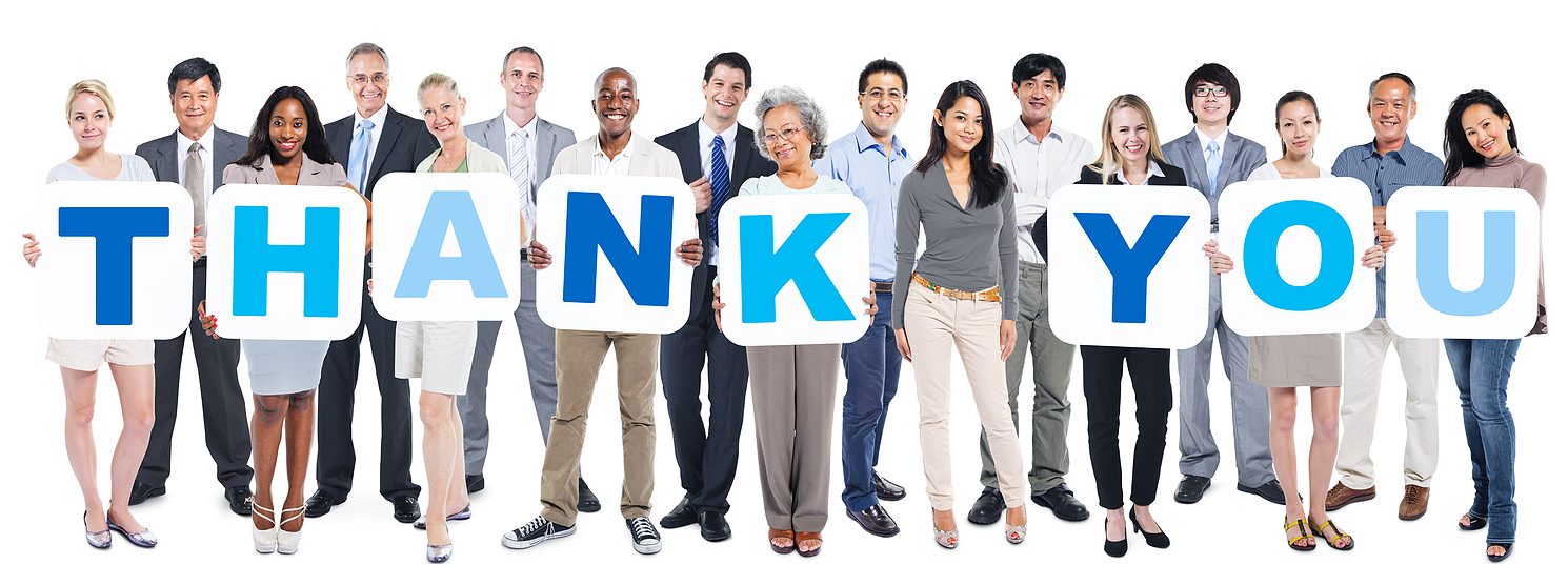 Group Of Multi-Ethnic Group Of Business People Holding Placards Forming Thank You